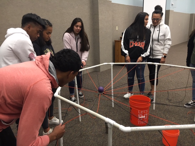 FSPS Native American students playing a game. 